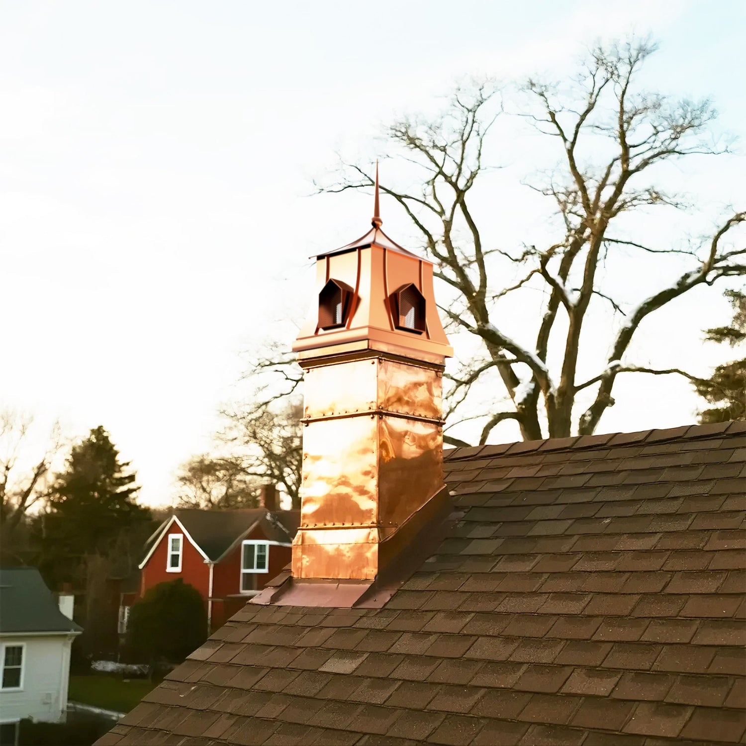 Copper chimney cap with pyramid design for residential chimneys