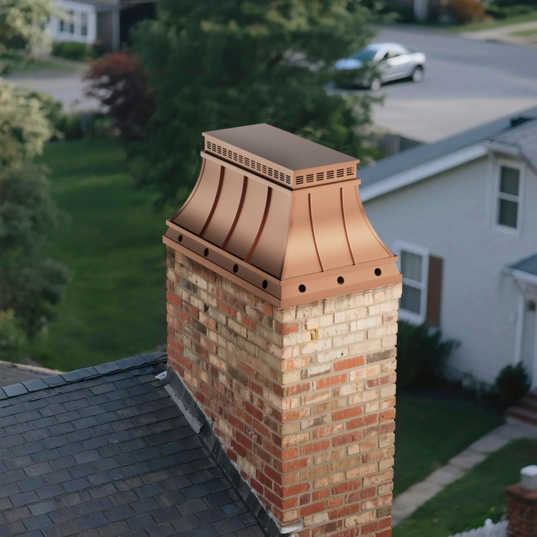 Copper chimney cap with custom shape for residential chimneys