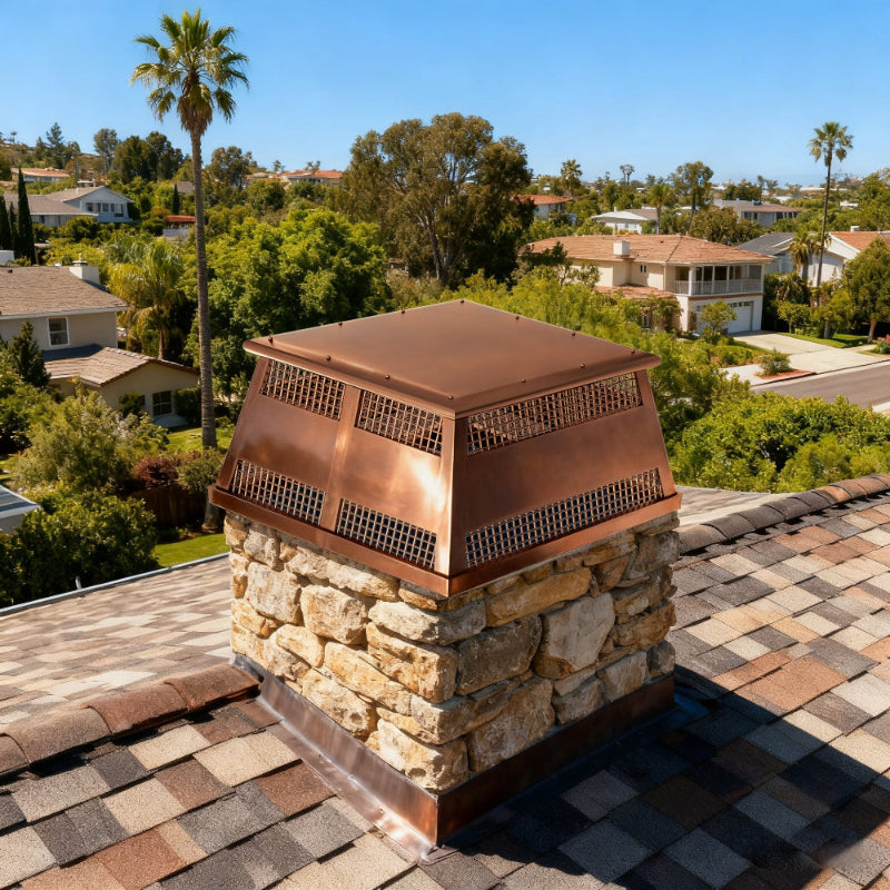 custom chimney cap in antique copper full width flat design with mesh and rivets at chimneycapmaster