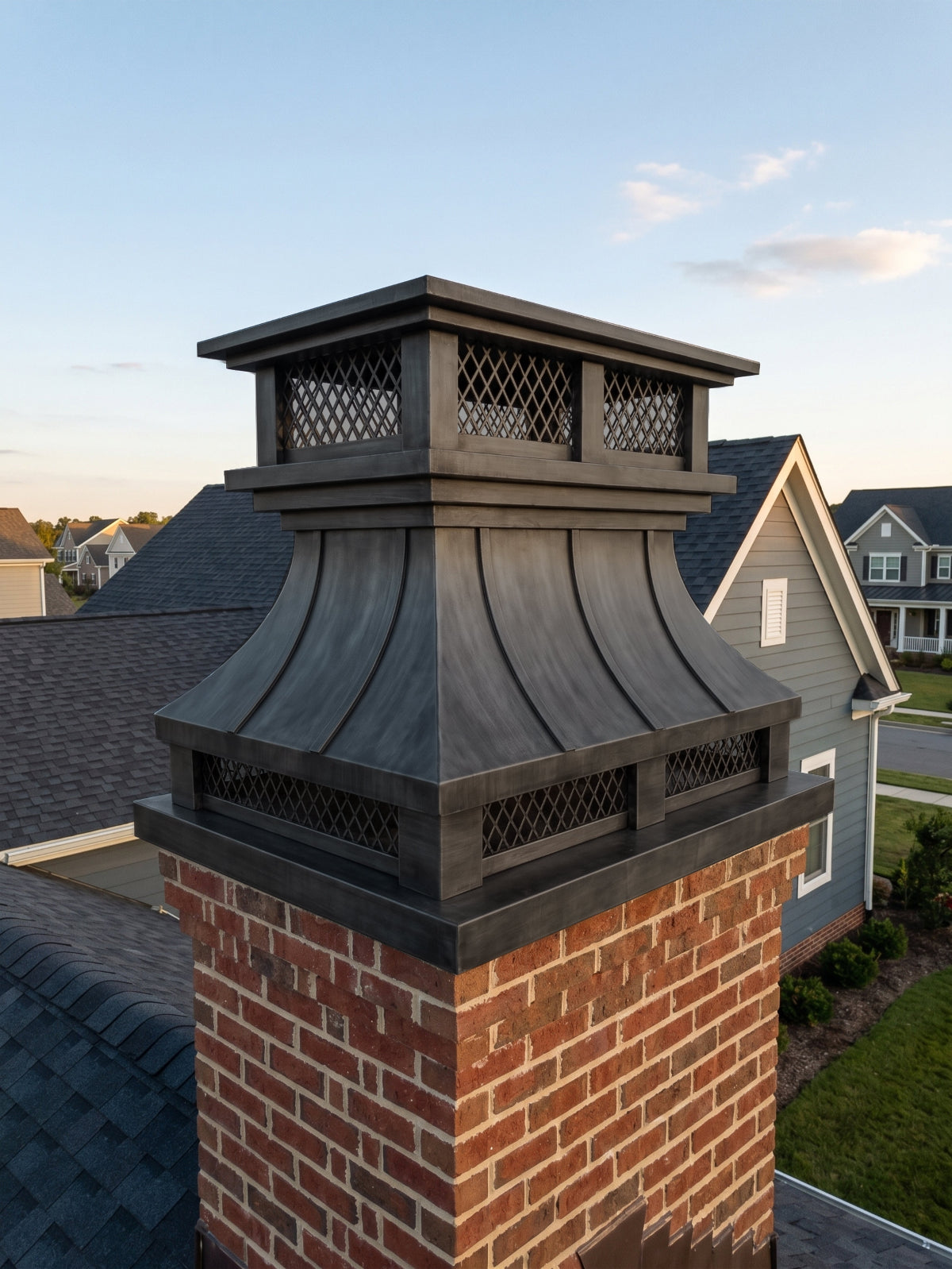 MASTER Custom Stainless Steel Chimney Cap High End Brushed Gray MS-F13 installed on residential chimney